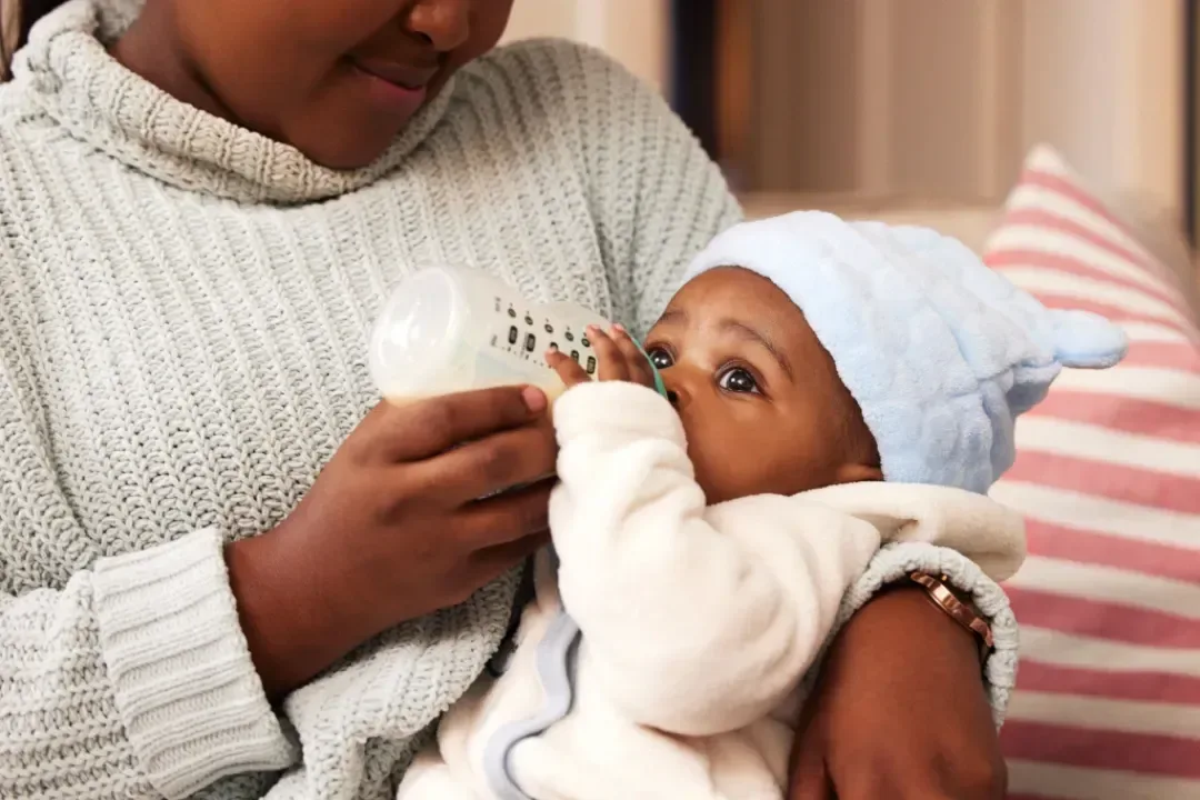 newborn baby bottle feeding