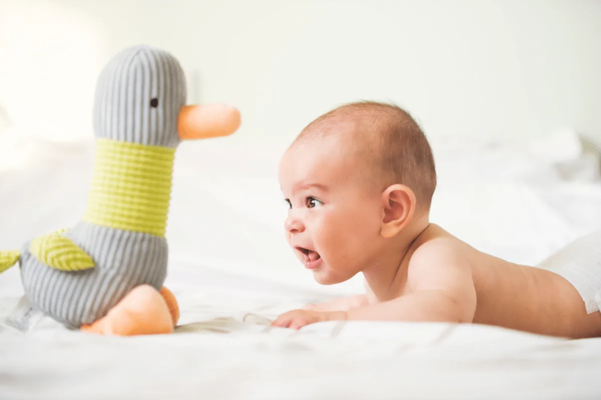 cover photo for The Importance of Tummy Time and How to Make It Fun