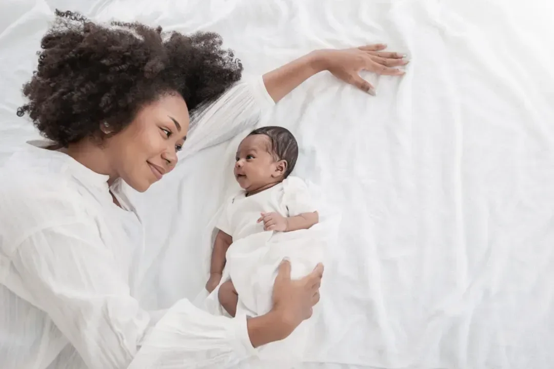 Postpartum mom with her baby
