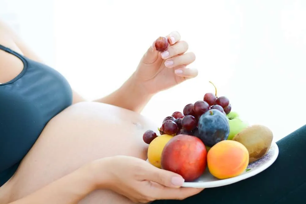 pregnant woman bowl of fruit