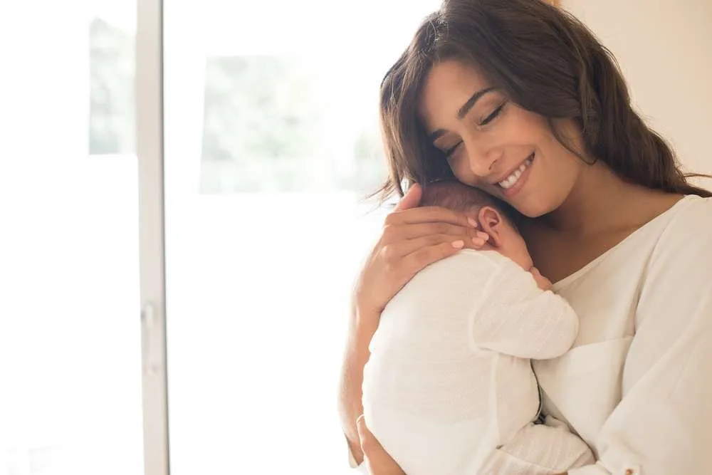 Woman with newborn baby